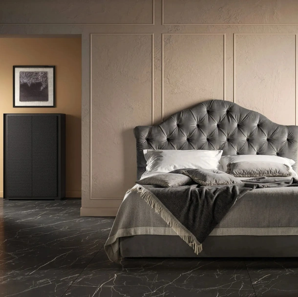 Letto in tessuto lavorazione capitonné con testiera sagomata Queen di Bside